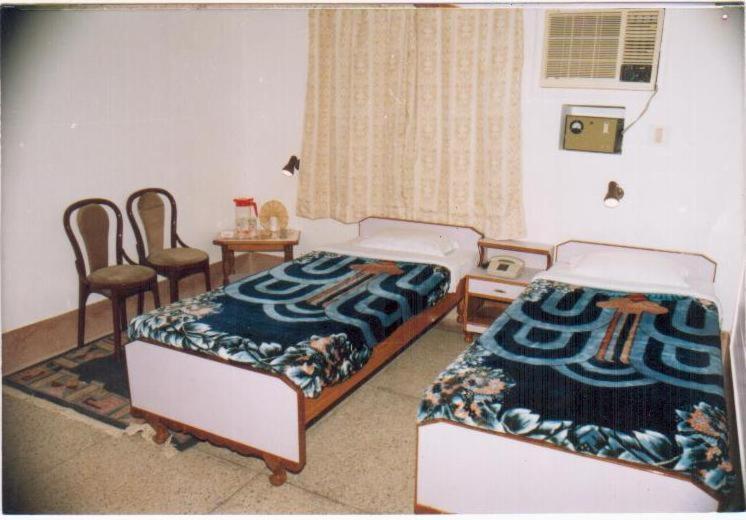 Radiant Ymca Tourist Hostel Varanasi Quarto foto